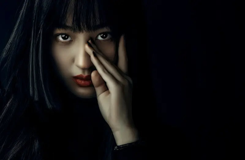 Discreet Asian woman in intimate portrait — OAFDating discretion